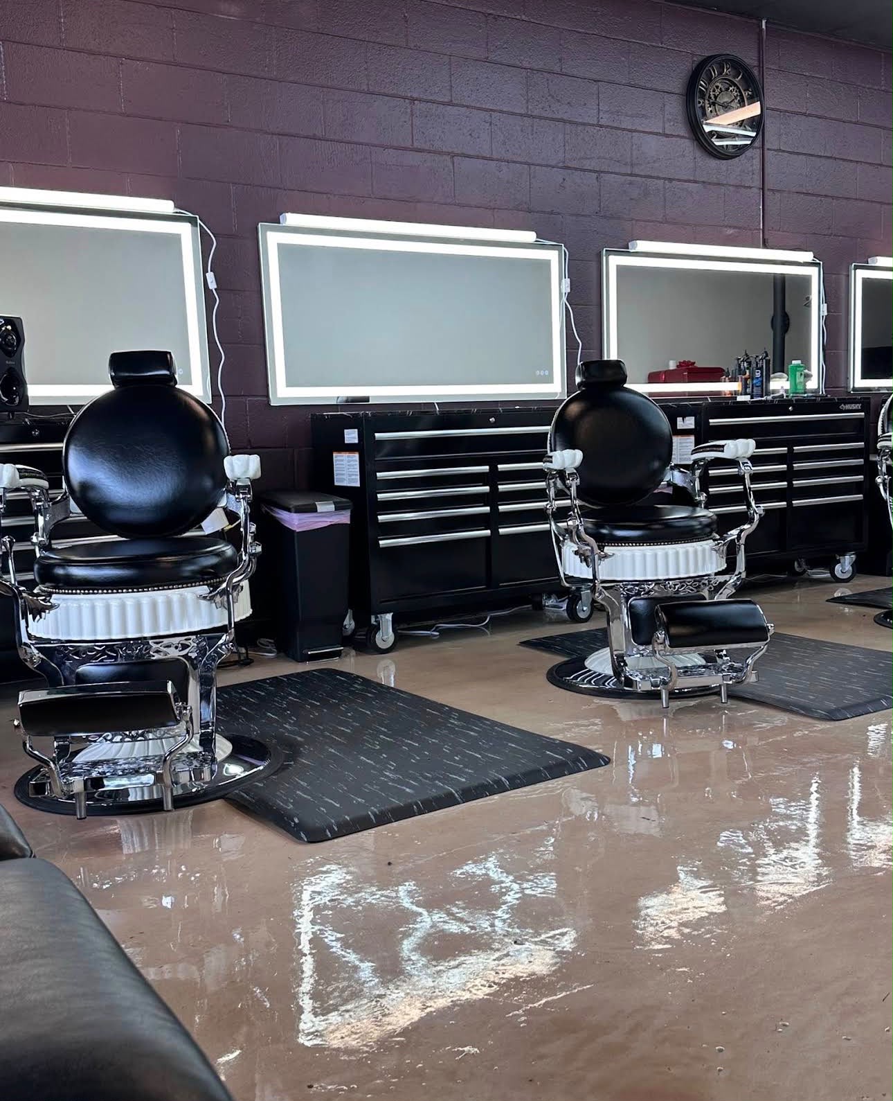 Stations with chrome chairs and illuminated mirrors
