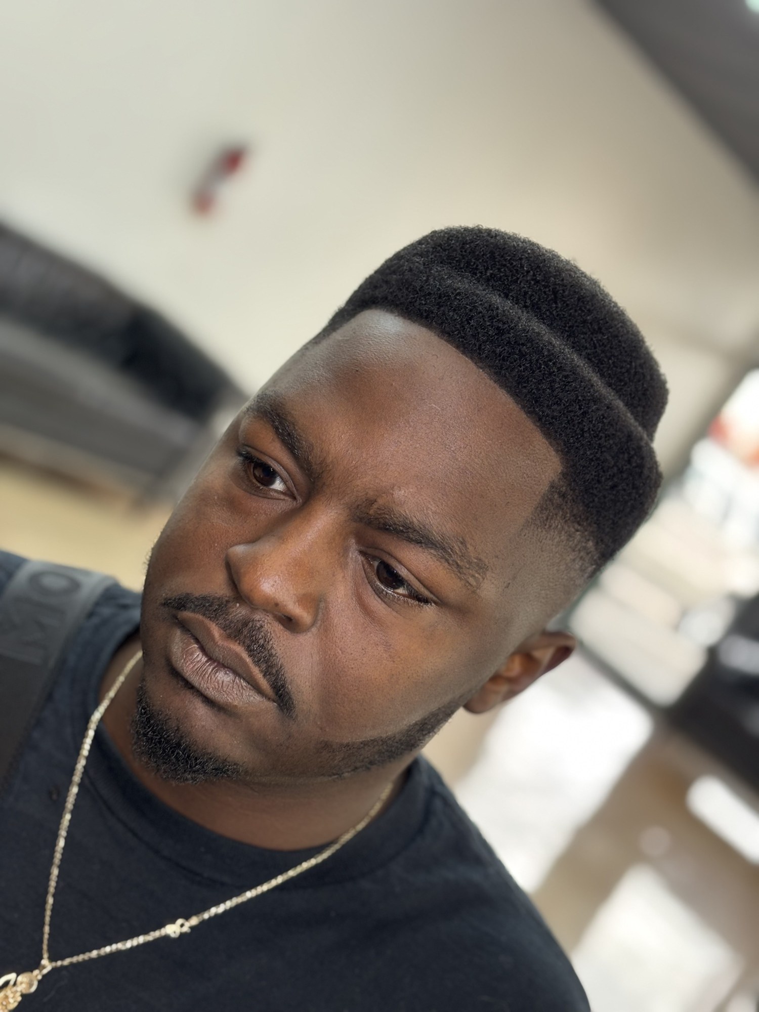 High Top Fade haircut by Jhoel at God Level Barbershop