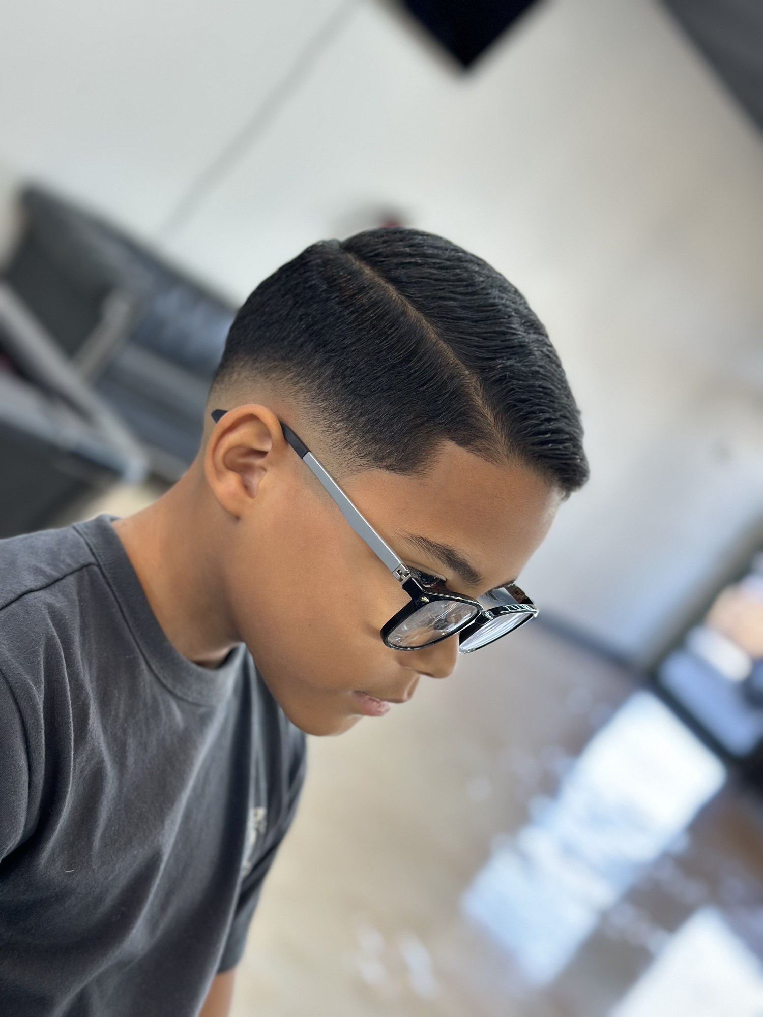 Kids Comb Over Fade haircut by Jhoel at God Level Barbershop
