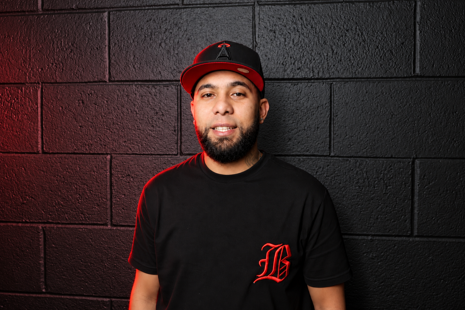 Portrait of Kevin at God Level Barbershop